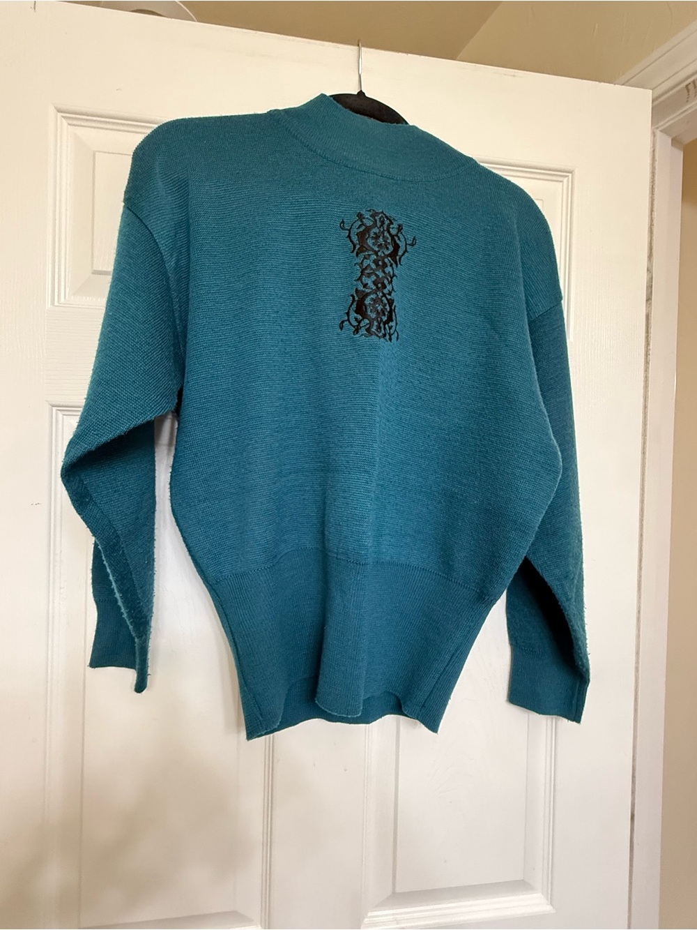 Cozy Teal Turtleneck Sweater with Embroidered Back Detail